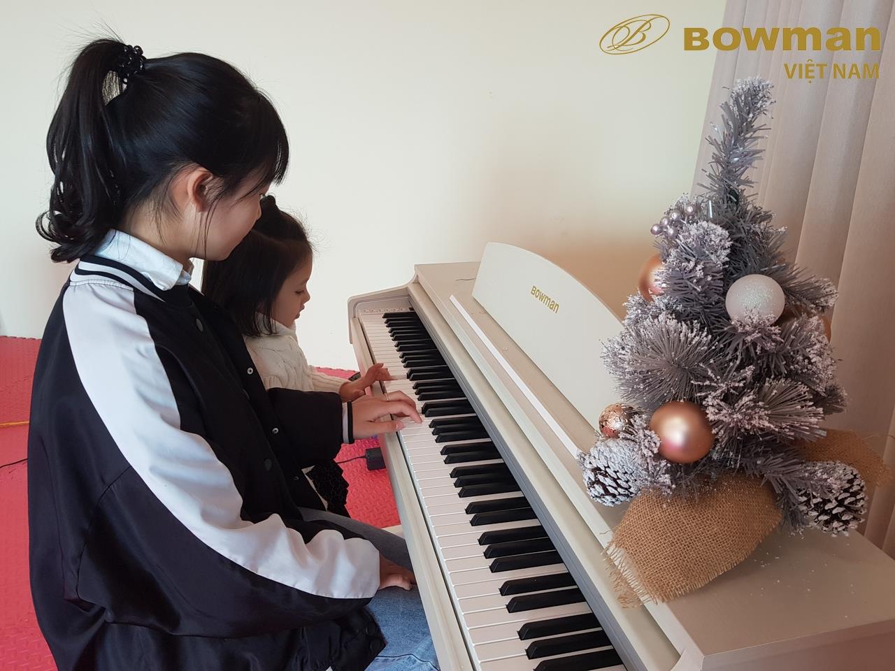 Nào, 2 chúng mình cùng tập đàn Piano nhé - BOWMAN CX250 WH - Màu trắng